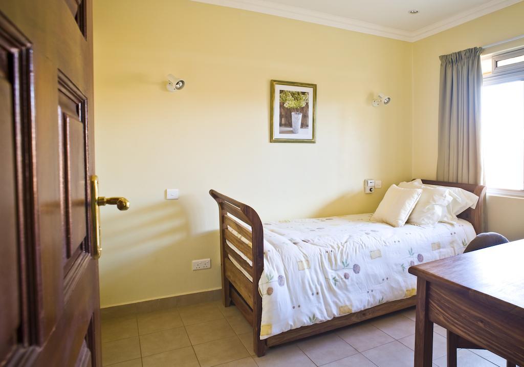Shakespeare Court Serviced Apartments Лусака Номер фото